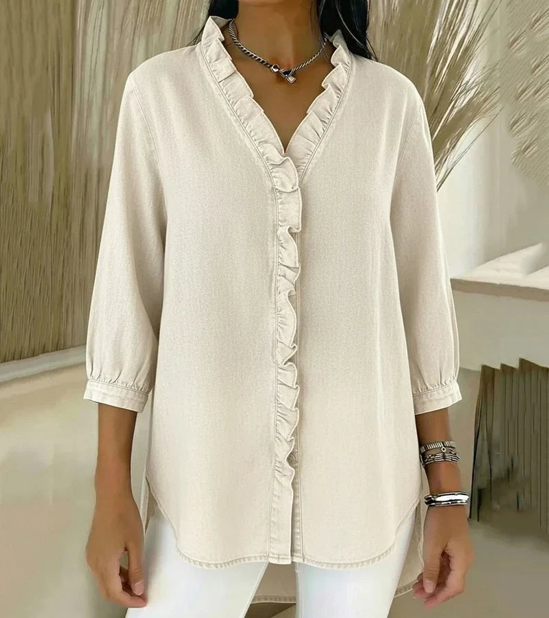 Adele | Fluid denim blouse with V-neck and ruffles